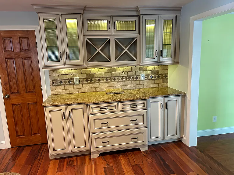 Cabinetry for storage.
