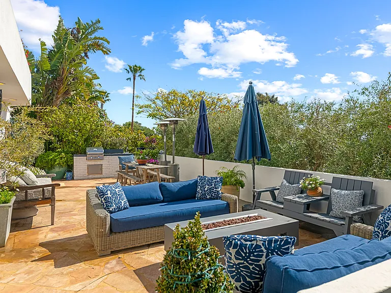 Outdoor living space, fireplace, TV
