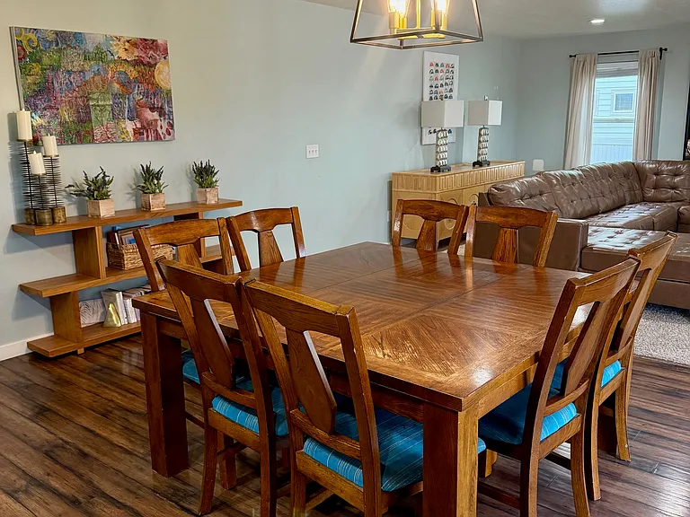 Large dining area open to living room and kitchen.