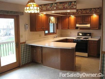 Kitchen
						:
						Oak cabinets, clean and beautiful view of lake. Large pantry.