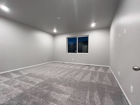 A primary bedroom perfect for unwinding after a long day.