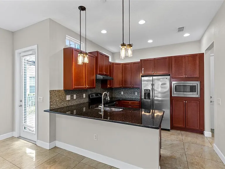13775 Benavente Ave — Photo 7