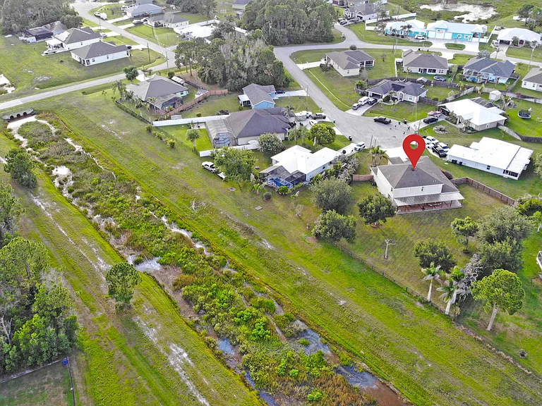 5648 NW Lorna Ct — Photo 49