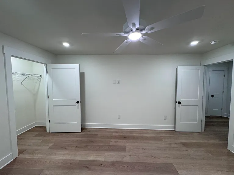 Upstairs 2nd Bedroom. Up to a queen bed.