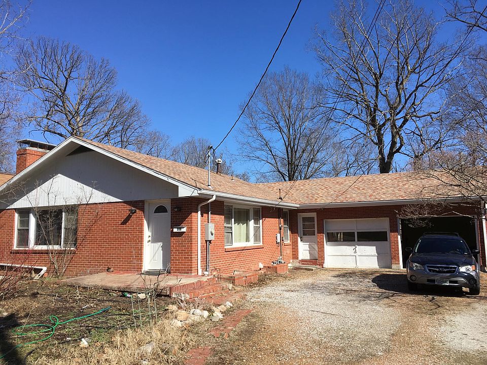 Front view with two car garage
