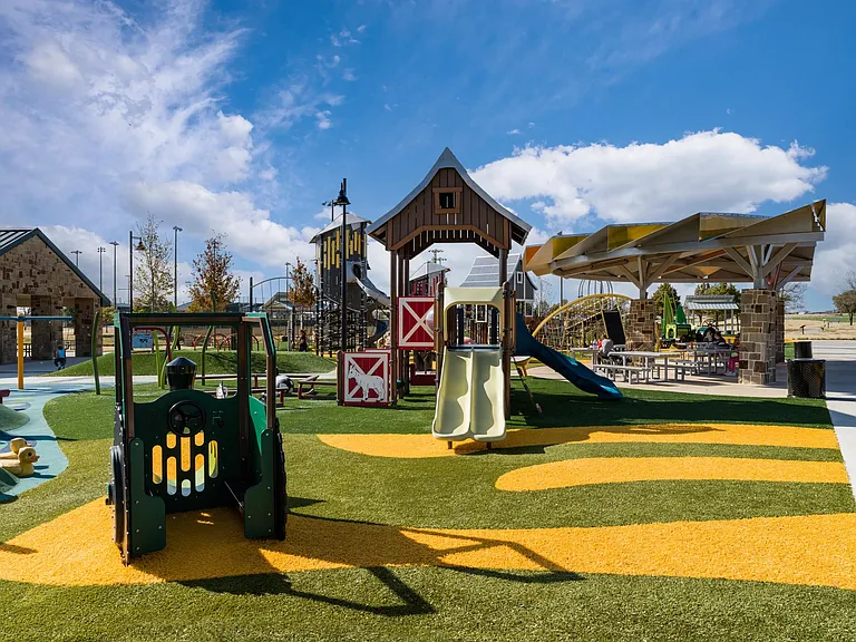 Old Celina Park offers a colorful playground, shaded seating, and open green space, creating a favorite spot for outdoor play and neighborhood gatherings.