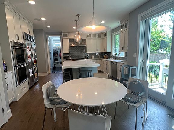 kitchen, with a view of the mudroom into the walk-in pantry and garage