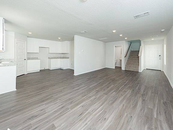 Dining Area to Kitchen and Family Room
