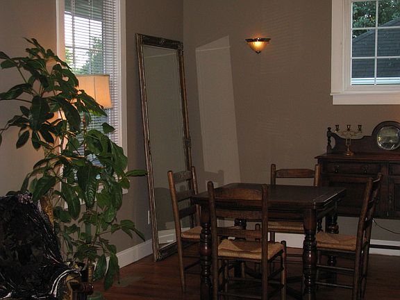 Dining Room - Hardwood flooring new lighting and paint