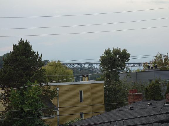 Spacious sky views with a view of the Aurora Ave bridge