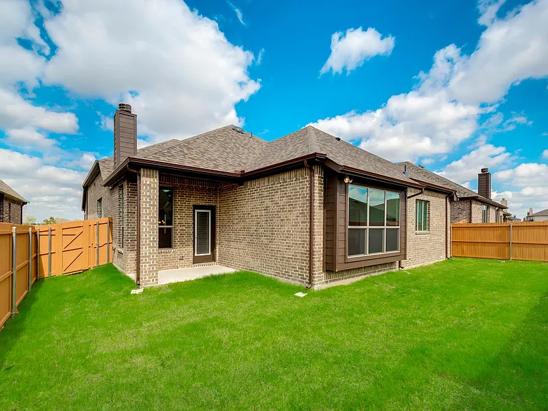 Rear porch and yard with fence