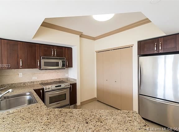 4th image of 19900 E Country Club Dr APT 909