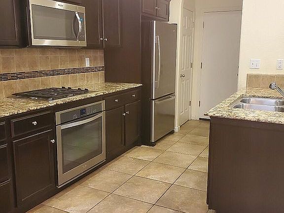 4th image of 7036 N Harmony Dr