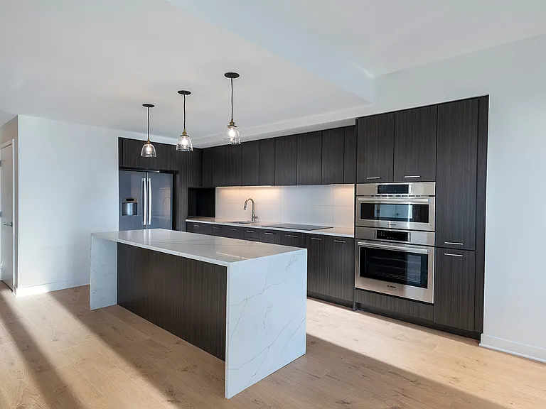 Large kitchen center island with modern appliances