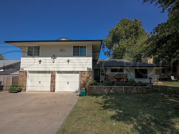 Natural stone/cement siding