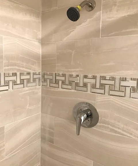 Brand new tiled bathroom with shower
