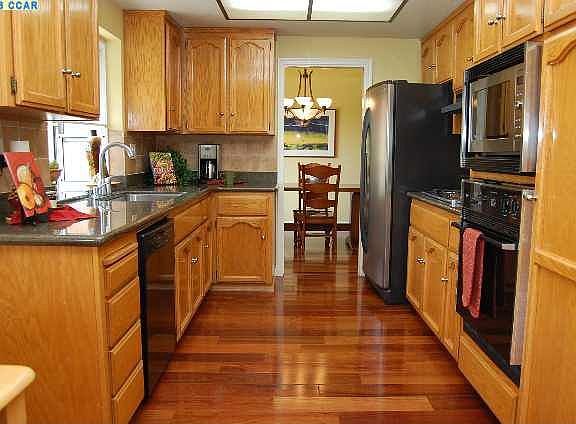 Updated floors and kitchen.