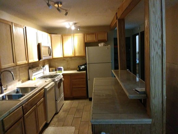 Open kitchen-left of entry