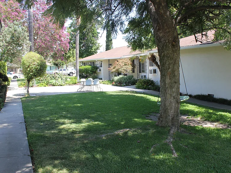 Enjoy shady green space in front of the unit