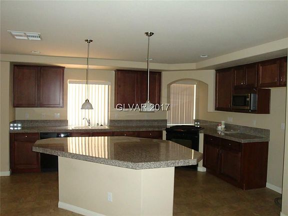 4th image of 6886 Treble Clef Ave
