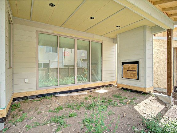 Covered outdoor living with gas fireplace! 