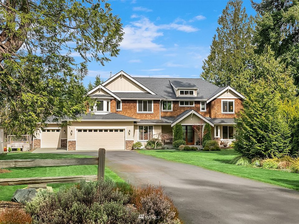 Flawless, contemporary home situated on an expansive and private 21,282 sq. ft. lot.