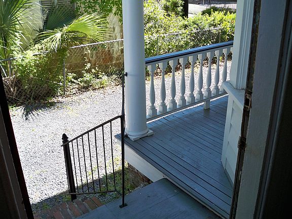 Front door view to shared private drive