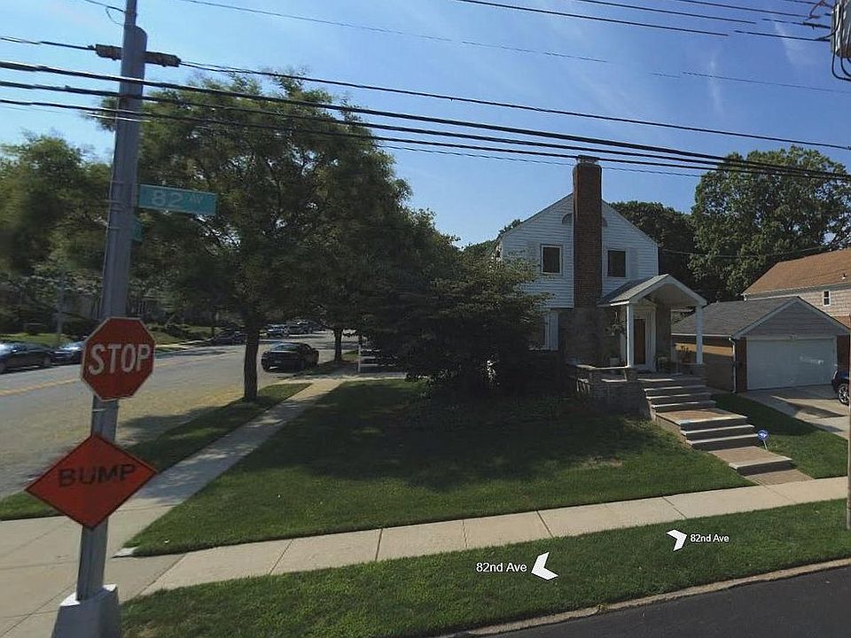 Whole house front view - Ample car parking, walking space, matured tress