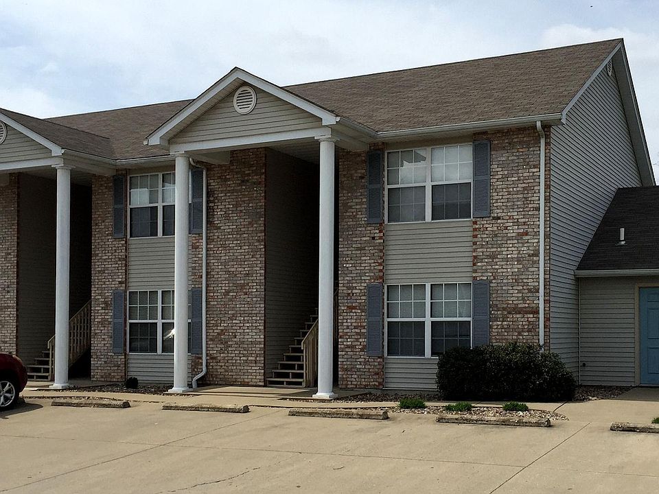 #19 is the ground-floor unit on the left. The laundry room for tenants is on the far right.