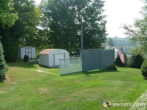 Back yard with 2 sheds and fence