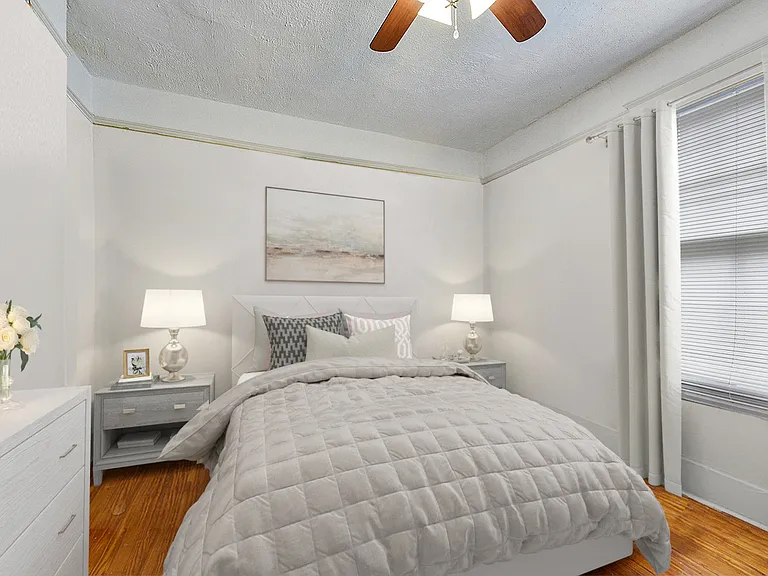 Spacious middle bedroom. Fits Queen sized bed and plenty of other furniture. No furniture included