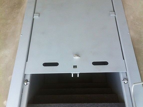 Tornado shelter in floor.