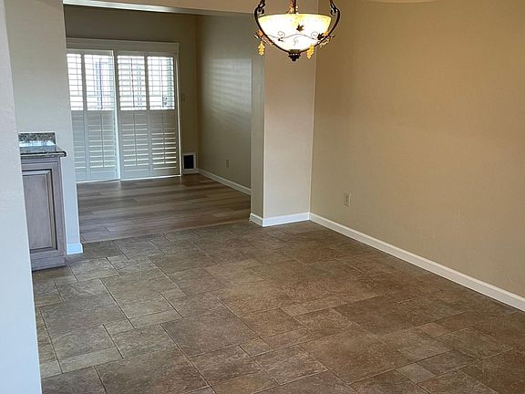 The dining area is conveniently located off of the kitchen and is central to the rest of the home.