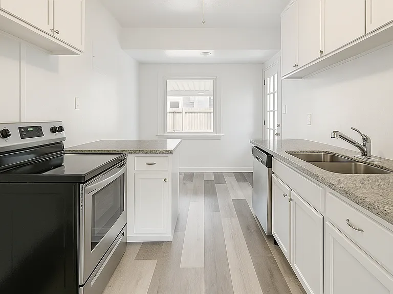 Updated kitchen with granite and new stainless appliances