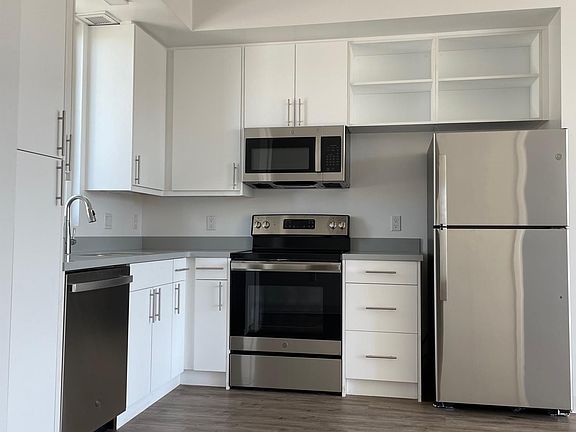 Kitchen, custom cabinetry, all stainless appliances including dishwasher