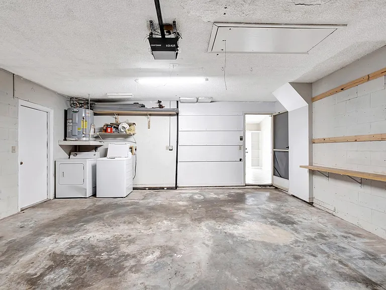 Garage with washer/ dryer hookup.