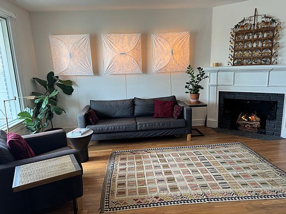 Living room has gas fireplace