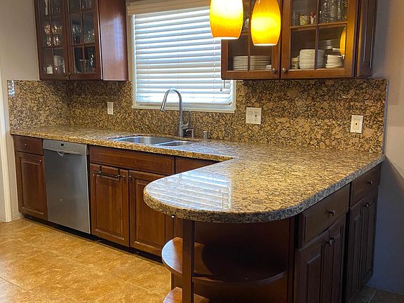 Granite countertops and stainless steel appliances