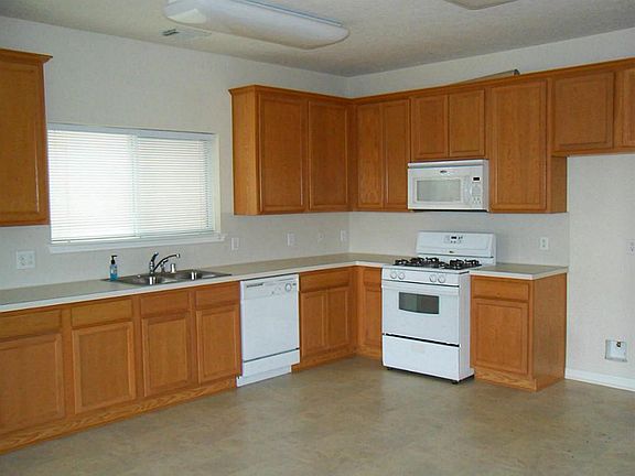 The kitchen has an abundance of cabinets for utensils. For someone who likes to cook this is a dream