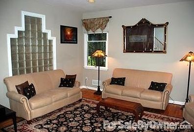 Living Room
						:
						Living Room (14.5x16) with hardwood floors; Glass Block wall allows light