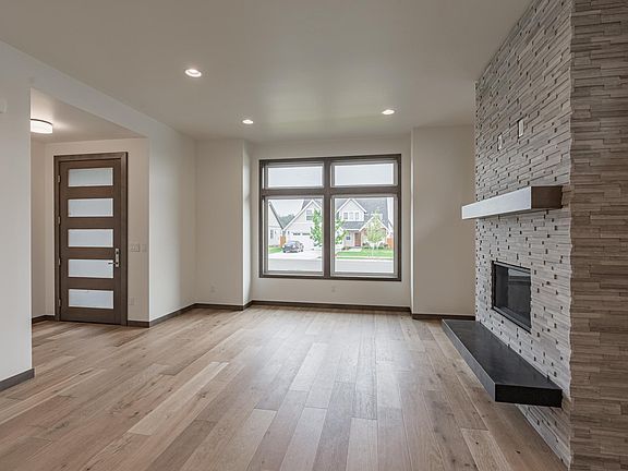 Nice entry door system, beautiful stained wood trim