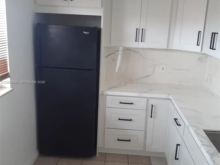 2800 NW 56th Ave #H404 — Photo 1
