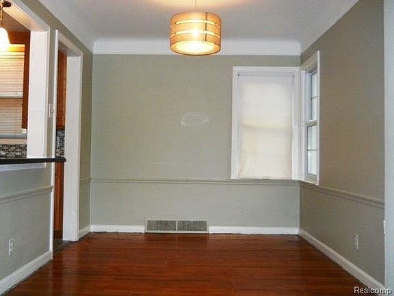 The Kitchen was opened into the Dining Room with a granite s