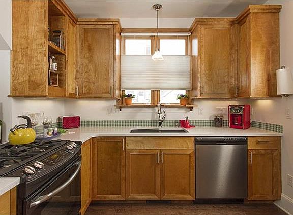 Bright Custom U Shaped Kitchen with Gas Range, Dishwasher, Garbage Disposal, Refrigerator with top Freezer and Multiple Small Applicances including Microwave, Coffee Pot, Grinder, Toaster, Blender, Mixer, Food Processor, and More!