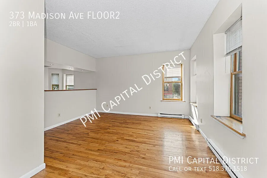 Spacious 2 Bedroom Apartment with In-Unit Laundry in the Heart of Center Square! — Photo 2