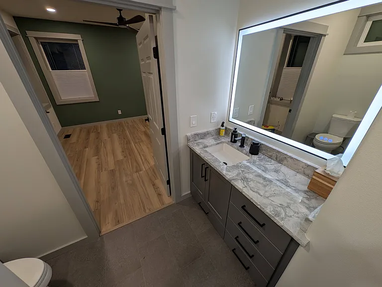 Bathroom vanity with heated floor.