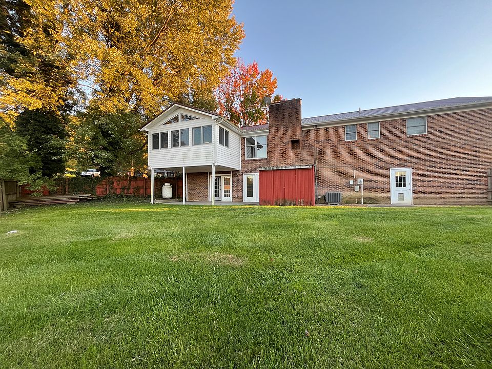 Fenced in backyard with covered porch and shed. French doors open to finished basement.