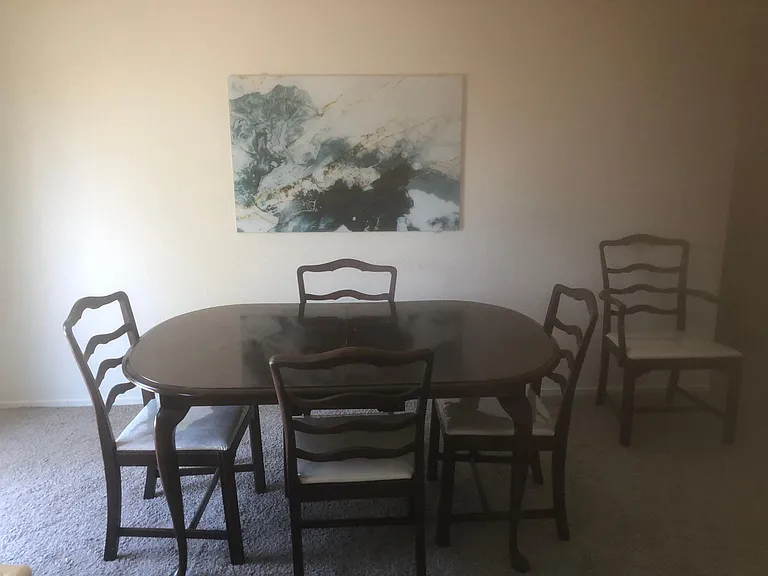 Dining table sits 4-5 people and 3 stools at kitchen counter
(sits 8 total)