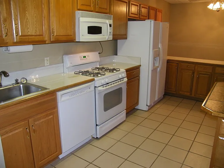 Full kitchen with gas range.