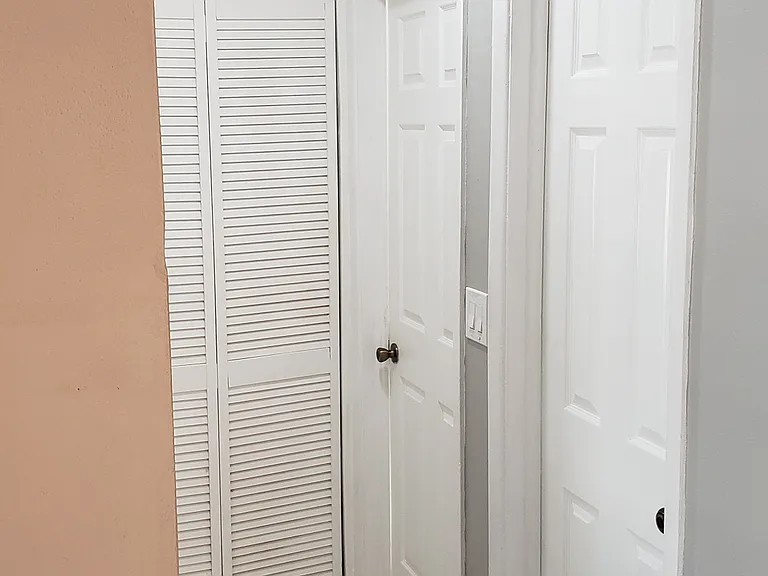 Hallway to Bathroom and Bedrooms.